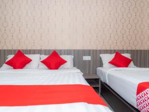Ένα ή περισσότερα κρεβάτια σε δωμάτιο στο MK Paradise hotel