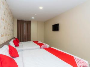 Ένα ή περισσότερα κρεβάτια σε δωμάτιο στο MK Paradise hotel