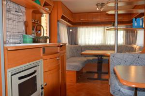 Kuchyň nebo kuchyňský kout v ubytování Camping Du Parc