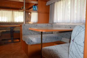 Lliteres en una habitació de Camping Du Parc