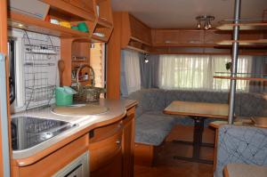 Kuchyň nebo kuchyňský kout v ubytování Camping Du Parc