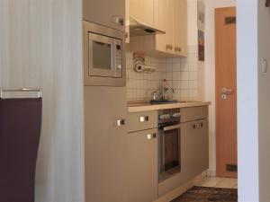 
Küche/Küchenzeile in der Unterkunft Apartments Residenz am Ryck - Nähe UNI und Kliniken
