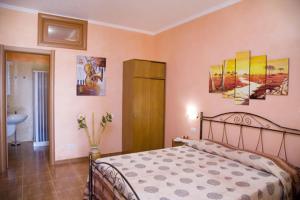 Postel nebo postele na pokoji v ubytování Villa Terra Nostra + 37 fotografií