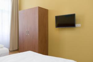 Telewizja i/lub zestaw kina domowego w obiekcie Vienna Stay Apartments Pezzl 1170