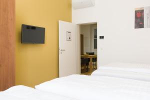 Telewizja i/lub zestaw kina domowego w obiekcie Vienna Stay Apartments Pezzl 1170