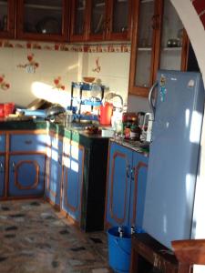 Kuchyň nebo kuchyňský kout v ubytování Himalayan Vacation Home