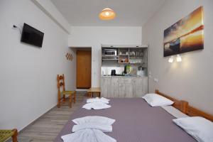 Postel nebo postele na pokoji v ubytování Αlexandros apartment