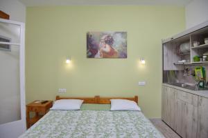 Postel nebo postele na pokoji v ubytování Αlexandros apartment