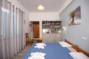 Postel nebo postele na pokoji v ubytování Αlexandros apartment