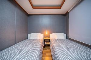Cama o camas de una habitación en Kyelim Motel & Guesthouse