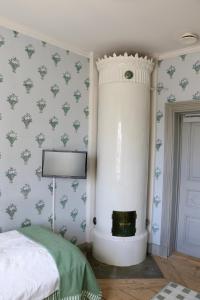 Postel nebo postele na pokoji v ubytování Thottska Villan