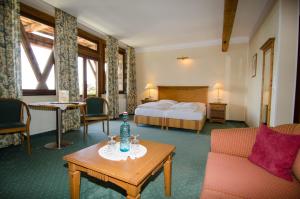 Postel nebo postele na pokoji v ubytování Hotel Ansitz Kematen ***S
