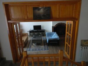 TV a/nebo společenská místnost v ubytování Casa Ligia