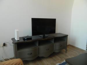 TV a/nebo společenská místnost v ubytování Casa Ligia
