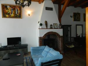 TV a/nebo společenská místnost v ubytování Casa Ligia