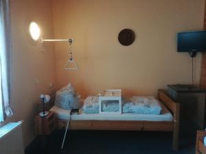 Postel nebo postele na pokoji v ubytování Pension Jitka
