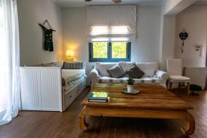 Posedenie v ubytovaní Zen Villa in Schinias