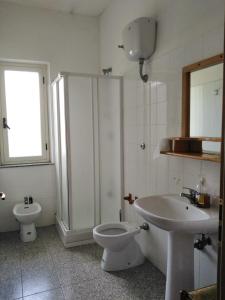 Een badkamer bij Punto Verde B&B