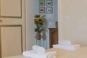Postel nebo postele na pokoji v ubytování Agriturismo La Ripolina