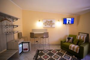 a living room with a couch and a table at B&B Trepo in Tropea +32 photos