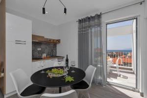 Nespecifikovaný výhled na moře nebo výhled na moře při pohledu z apartmánu