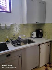 Kuchyň nebo kuchyňský kout v ubytování Apartments Tamaris