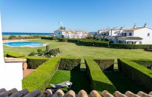 an aerial view of a house with a garden at LA PLATERA " Seaview " in L'Estartit