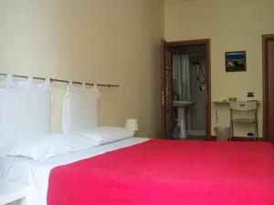 Posteľ alebo postele v izbe v ubytovaní B&B CARAVAGGIO SIRACUSA 200 Metres from Ortigia
