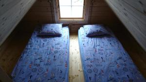 
Voodi või voodid majutusasutuse Aadel Guesthouse toas
