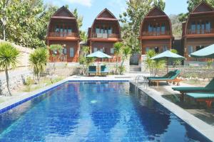 Bazén v ubytování Adara Beach Huts nebo v jeho okolí