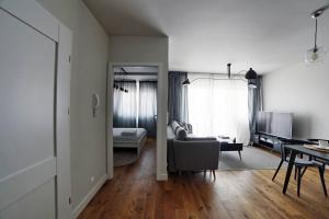 Posteľ alebo postele v izbe v ubytovaní One Apartment