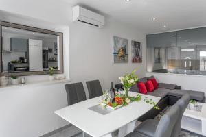 Kuchyň nebo kuchyňský kout v ubytování Apartments Amore