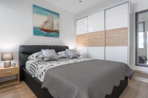 Postel nebo postele na pokoji v ubytování Apartments Amore