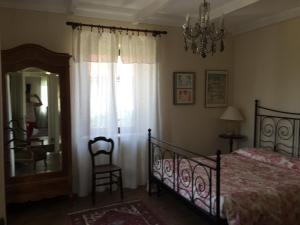 Łóżko lub łóżka w pokoju w obiekcie VILLA LE ROSE