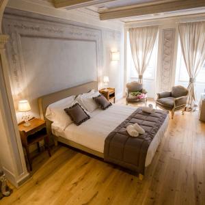 Posteľ alebo postele v izbe v ubytovaní San Pier Novello in Oltrarno