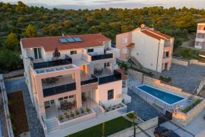 an aerial view of a house with a swimming pool at Villa Croatica II in Šibenik