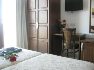 Postel nebo postele na pokoji v ubytování Palates Hotel