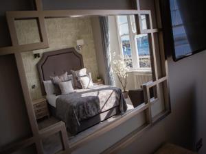 Katil atau katil-katil dalam bilik di Eccles Hotel and Spa