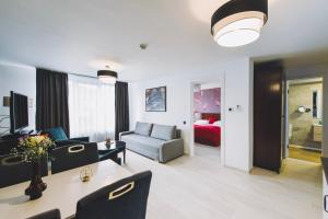 Posezení v ubytování Derby Apart Hotel