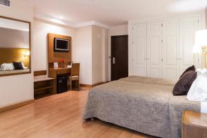 Postel nebo postele na pokoji v ubytování Hotel Don Paco
