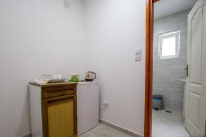 Kuchyň nebo kuchyňský kout v ubytování Guesthouse Dapcevic
