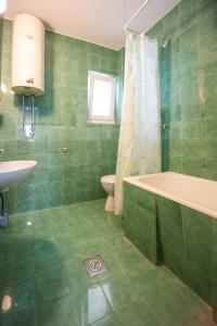 Koupelna v ubytování Guesthouse Dapcevic