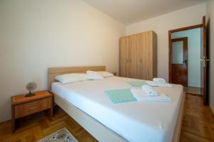 Ένα ή περισσότερα κρεβάτια σε δωμάτιο στο Guesthouse Dapcevic