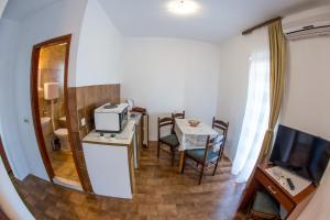 Kuchyň nebo kuchyňský kout v ubytování Guesthouse Dapcevic