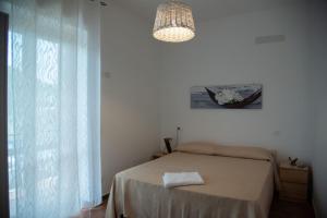 Postel nebo postele na pokoji v ubytování Casa Floris
