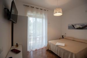 Postel nebo postele na pokoji v ubytování Casa Floris