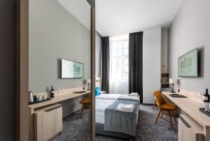 Televízia a/alebo spoločenská miestnosť v ubytovaní Korona Gold - Korona Hotel Wrocław