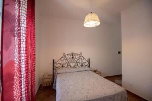 Postel nebo postele na pokoji v ubytování Casa Floris