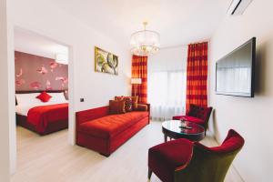 Postel nebo postele na pokoji v ubytování Derby Apart Hotel