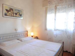 Een bed of bedden in een kamer bij Casavacanza Villa Mare ! 100 metri dalla spiaggia!